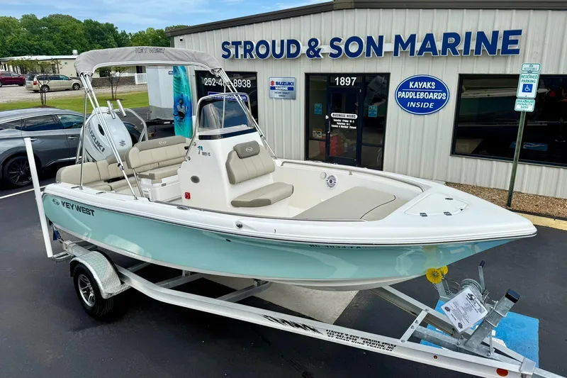 Slide: The Image of 2023 Key West 189 FS boat on trailer at Stroud & Son Marine dealership. - 6