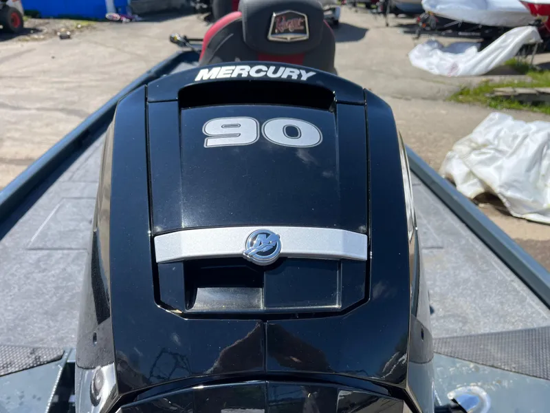 Slide: The Image of 2024 Ranger RT188C boat with Mercury 90 engine, outdoor setting. - 11