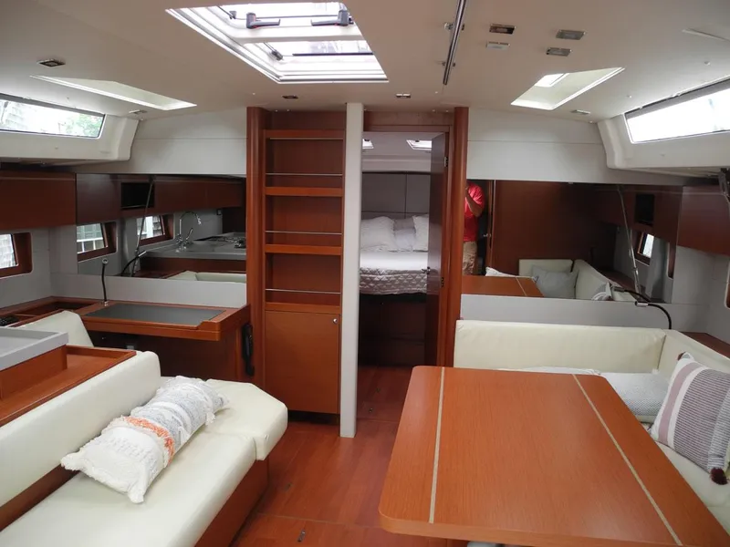 Slide: The Image of Luxurious interior of 2020 Beneteau Oceanis 51.1 yacht with modern wood finish and spacious layout. - 27