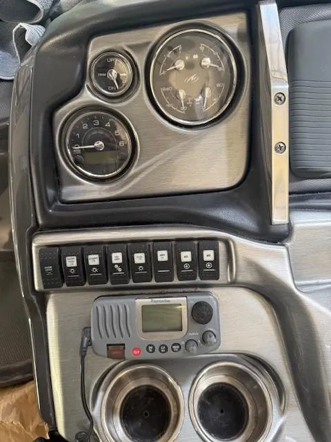 Slide: The Image of Dashboard of a 2013 Monterey 340 Sport Yacht with gauges and controls. - 31