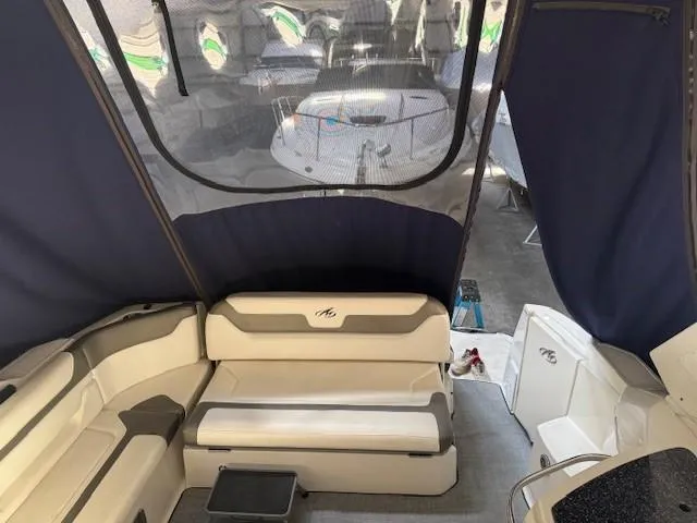 Slide: The Image of Interior view of 2013 Monterey 340 Sport Yacht with seating and canopy. - 35