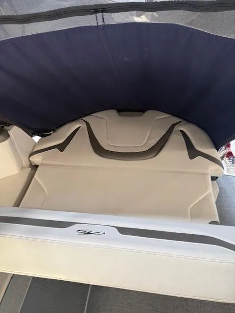 Slide: The Image of 2013 Monterey 340 Sport Yacht interior seating with blue canopy. - 37