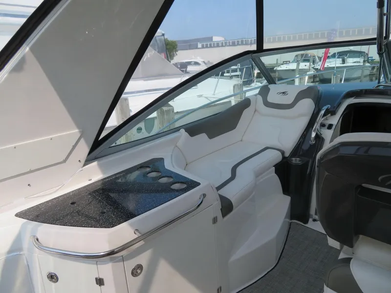 Slide: The Image of Interior of 2013 Monterey 340 Sport Yacht with sleek seating and modern design. - 9