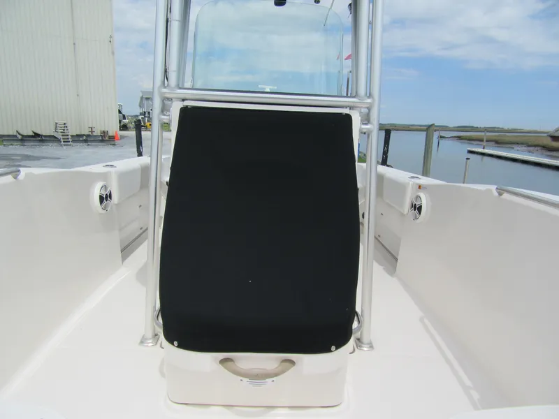 Slide: The Image of 2014 Robalo R200 Center Console boat interior with black seat and stainless steel frame. - 8