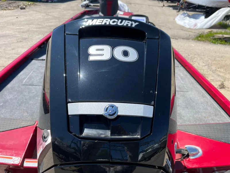Slide: The Image of 2024 Ranger RT188 boat with Mercury 90 engine, red and black design. - 12