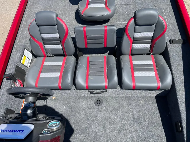 Slide: The Image of 2024 Ranger RT188 boat interior with gray and red seating arrangement. - 5