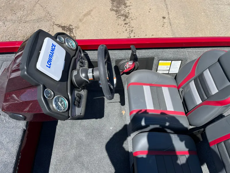 Slide: The Image of 2024 Ranger RT188 boat interior with Lowrance display and dual-tone seats. - 6