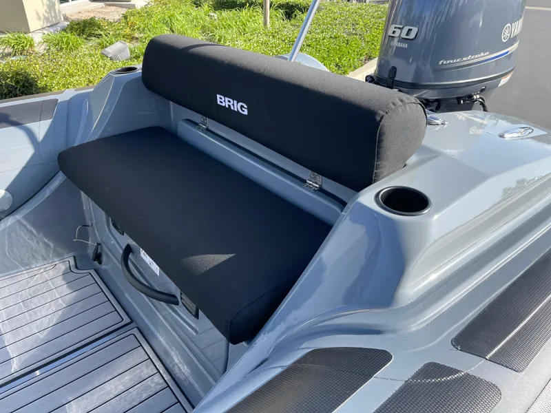 Slide: The Image of 2021 Brig Eagle 4 boat interior with seating and Yamaha engine. - 19