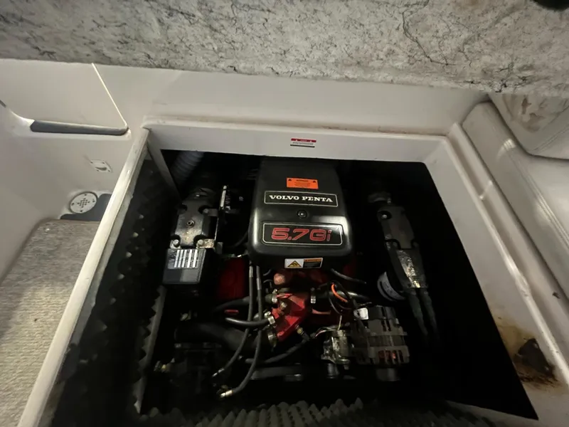 Slide: The Image of Engine compartment of 2002 Ebbtide 2400 Mystique with Volvo Penta 5.7G motor. - 21