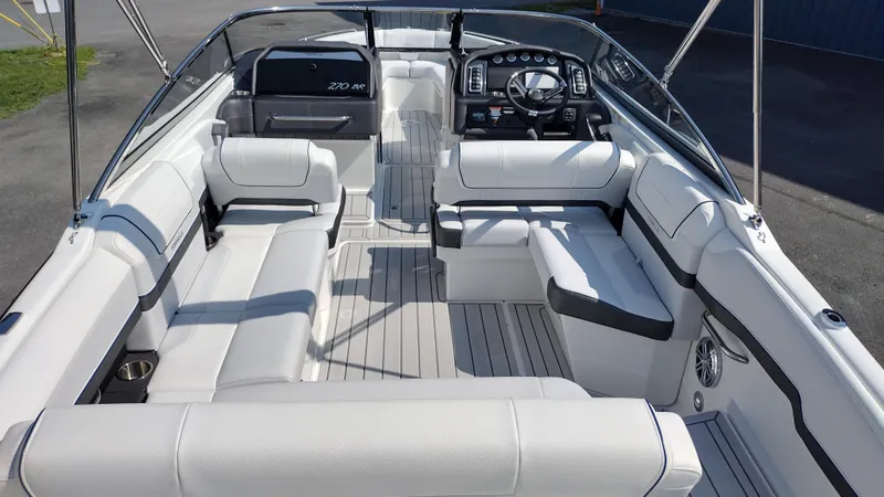 Slide: The Image of 2026 Formula 270 Bowrider dashboard with steering wheel and Mercury controls. - 13