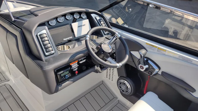 Slide: The Image of Luxurious seating on 2026 Formula 270 Bowrider boat, featuring sleek white and black upholstery. - 16