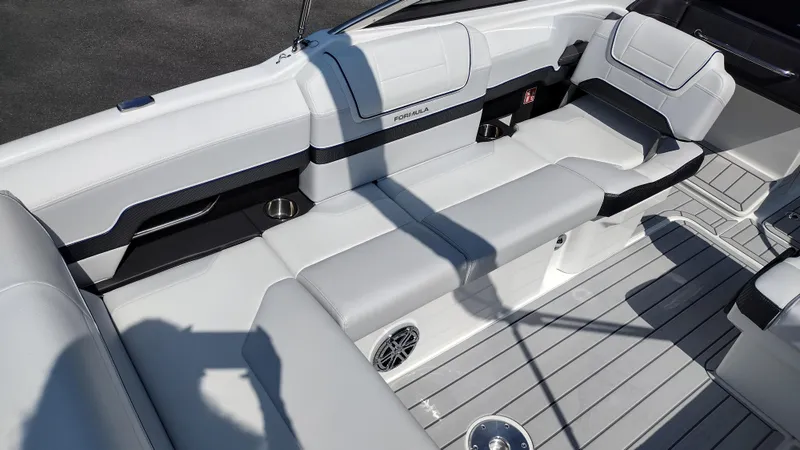 Slide: The Image of 2026 Formula 270 Bowrider boat interior with sleek white seating and integrated cup holders. - 30
