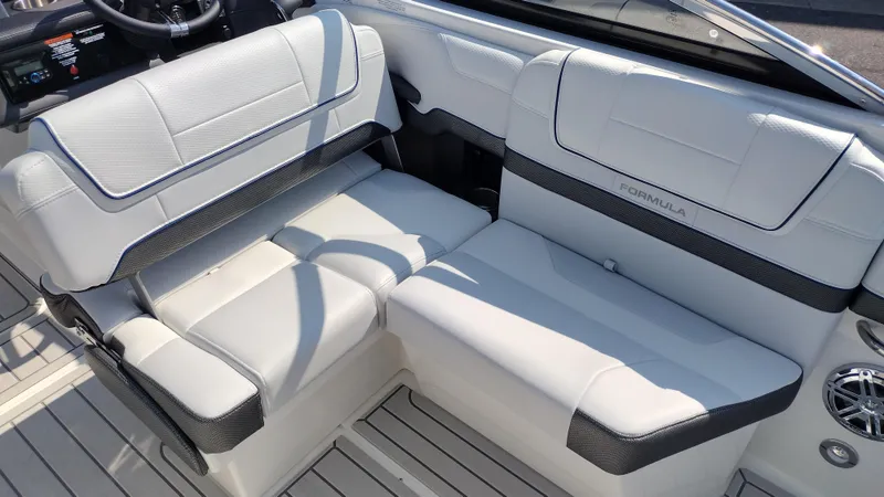 Slide: The Image of 2026 Formula 270 Bowrider boat with sleek seating and integrated cup holders. - 31