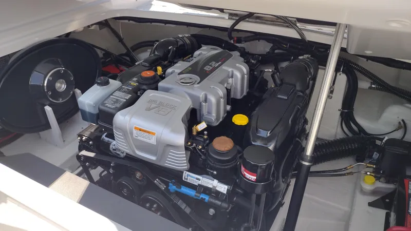 Slide: The Image of 2026 Formula 270 Bowrider audio control panel on white boat surface. - 35