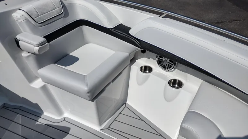 Slide: The Image of 2026 Formula 270 Bowrider boat in a warehouse, featuring sleek blue and white design. - 43