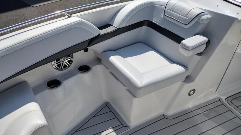 Slide: The Image of 2026 Formula 270 Bowrider boat with sleek, modern design in a showroom setting. - 44