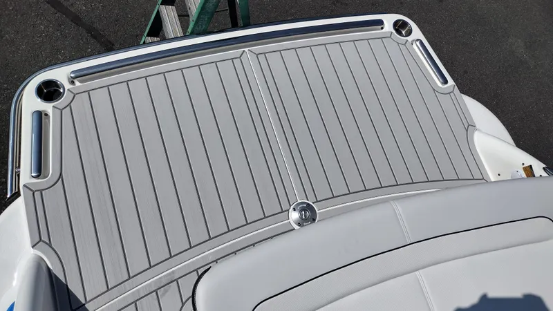 Slide: The Image of 2026 Formula 270 Bowrider interior with sleek white seating and modern steering wheel. - 51