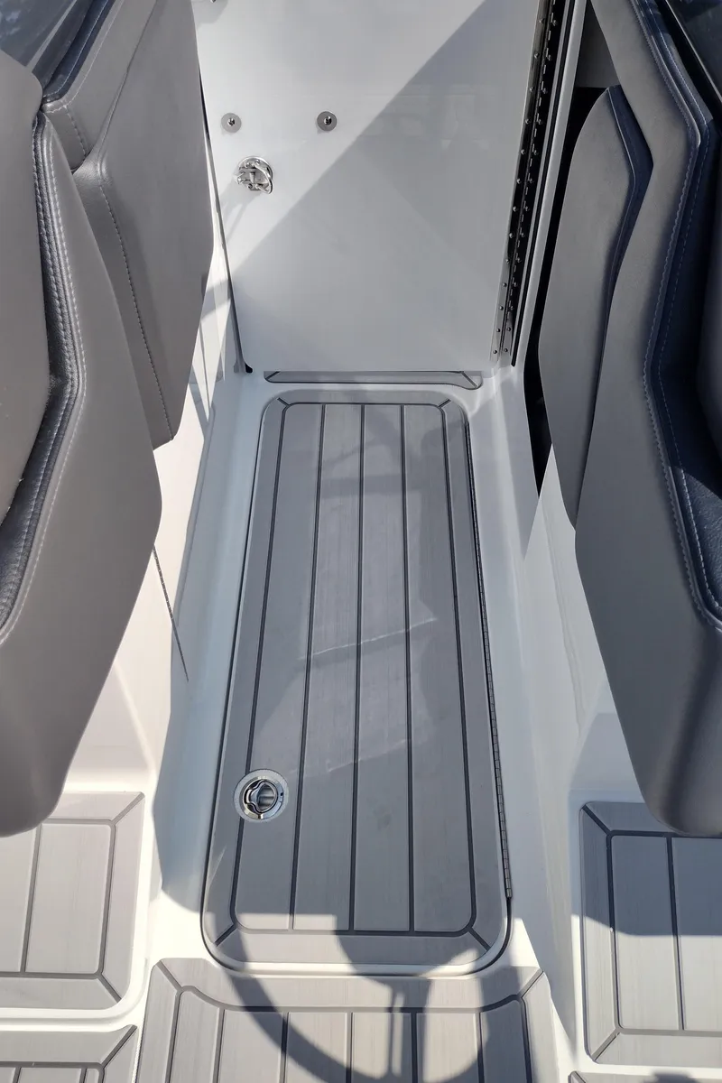 Slide: The Image of 2026 Formula 270 Bowrider interior with sleek white seating and modern design. - 57