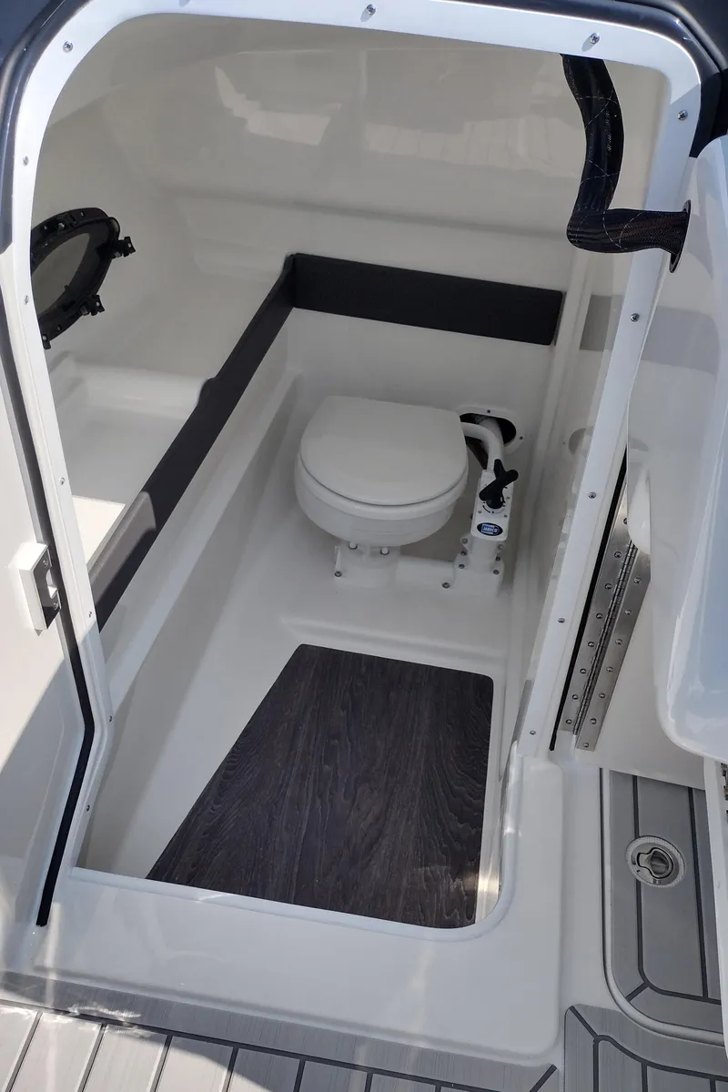 Slide: The Image of Engine compartment of 2026 Formula 270 Bowrider boat, showcasing powerful V8 engine. - 62