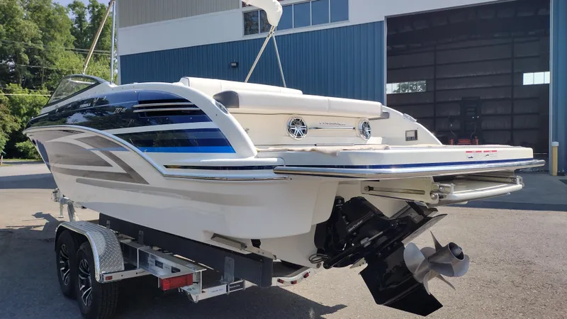 Slide: The Image of 2026 Formula 270 Bowrider boat with sleek design and modern graphics. - 7