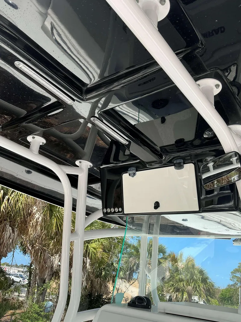 Slide: The Image of 2017 Cape Horn 36 XS boat interior with sleek black and white design. - 11