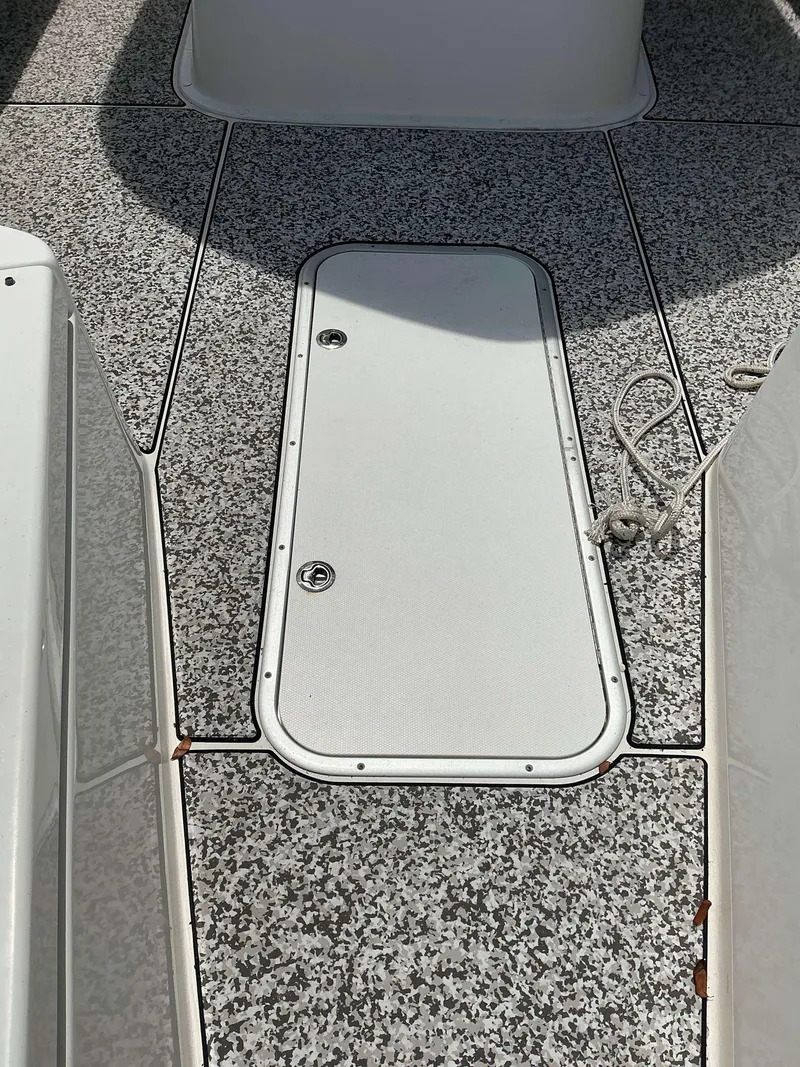 Slide: The Image of 2017 Cape Horn 36 XS boat deck with storage hatch and rope. - 15