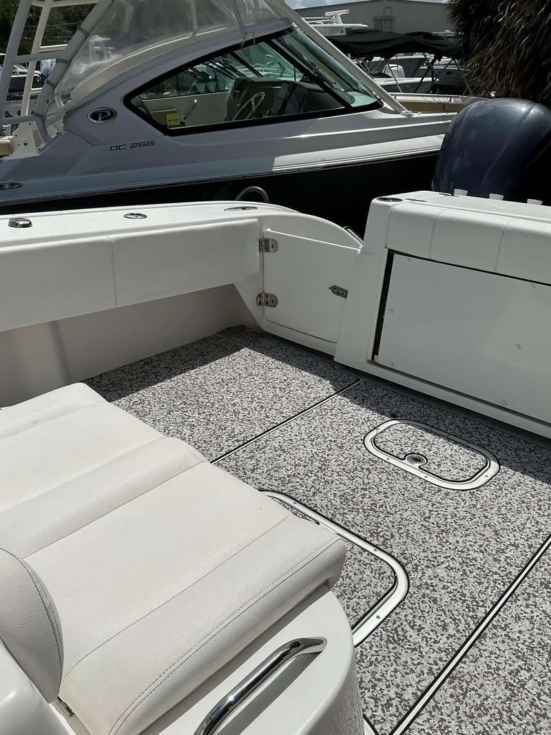 Slide: The Image of 2017 Cape Horn 36 XS boat interior with white seating and speckled flooring. - 18