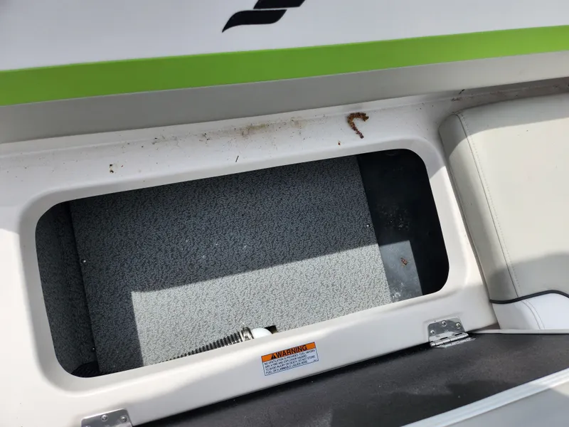 Slide: The Image of Storage compartment of 2023 Starcraft SVX 191 OB boat, featuring a clean interior. - 21