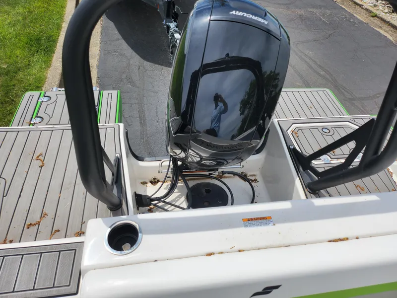 Slide: The Image of 2023 Starcraft SVX 191 OB boat with Mercury outboard motor, viewed from the rear deck. - 22