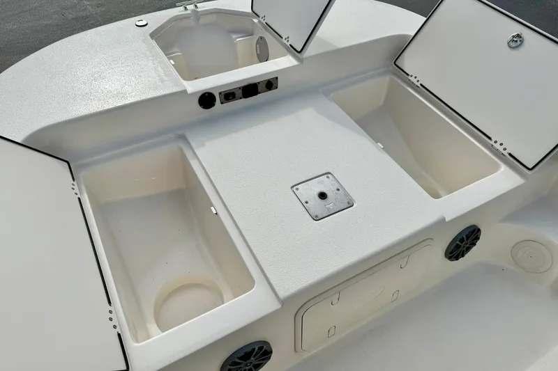 Slide: The Image of 2024 Carolina Skiff 19 LS boat storage compartments and seating area. - 14