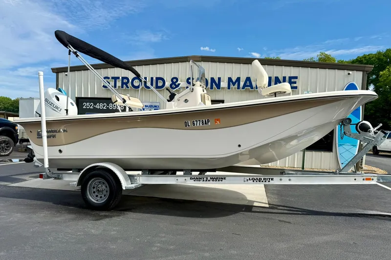 Slide: The Image of 2024 Carolina Skiff 19 LS boat on trailer at Stroud & Son Marine dealership. - 4