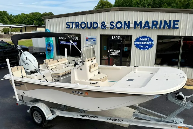 Slide: The Image of 2024 Carolina Skiff 19 LS boat on trailer at Stroud & Son Marine dealership. - 7
