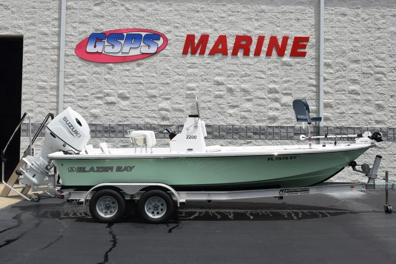 Slide: The Image of 2017 Blazer Bay 2200 boat on trailer at GSPS Marine dealership. - 1