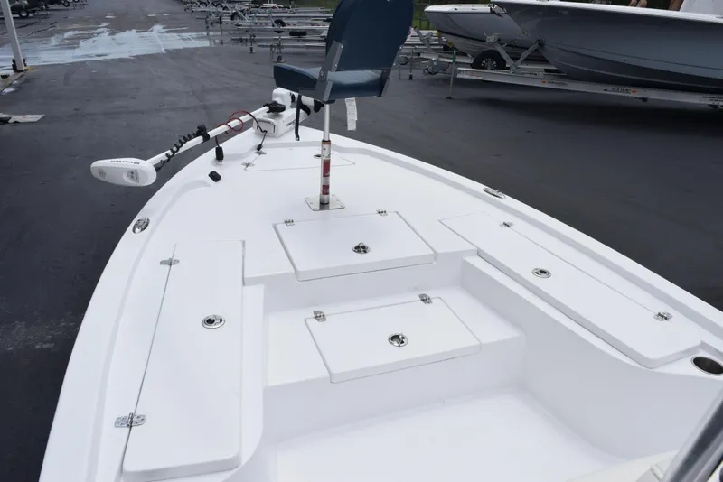 Slide: The Image of 2017 Blazer Bay 2200 boat deck with seating and storage compartments. - 11