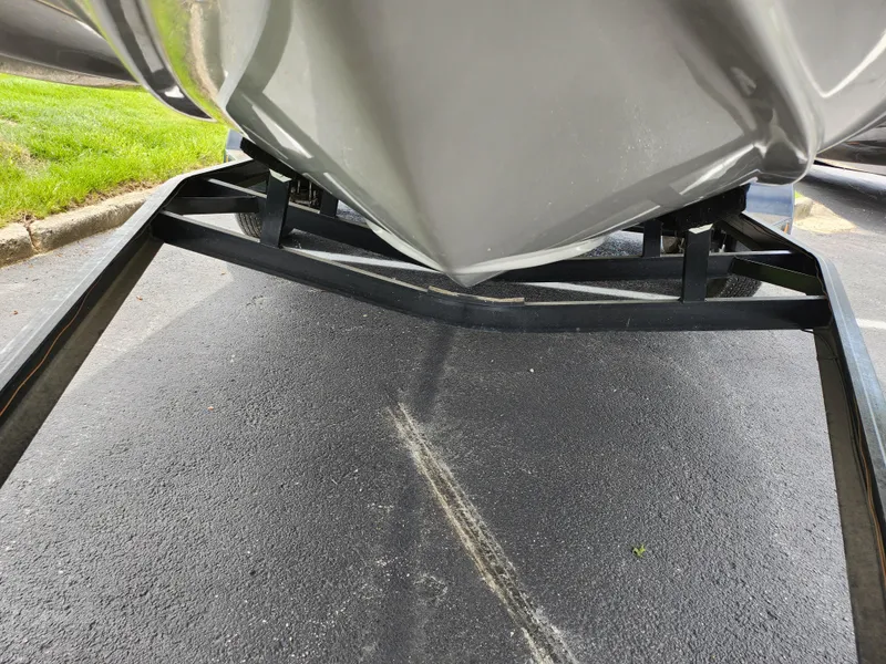 Slide: The Image of 2021 Starcraft SVX 191 OB boat on trailer, close-up view of hull and frame. - 8