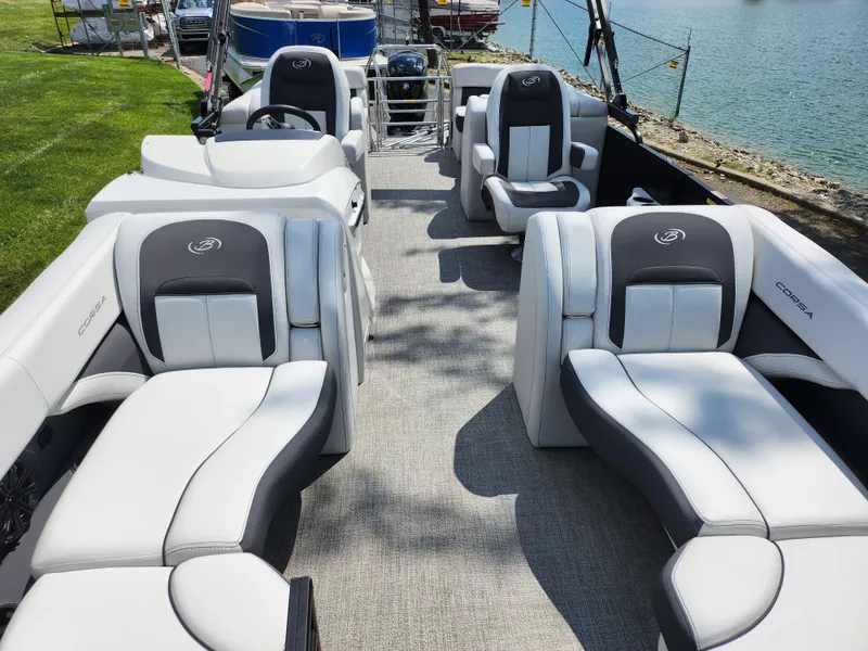 Slide: The Image of 2021 Barletta CORSA 23QC pontoon boat with luxurious seating and modern design. - 11