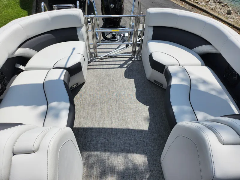 Slide: The Image of 2021 Barletta CORSA 23QC pontoon boat with spacious seating and modern design. - 16