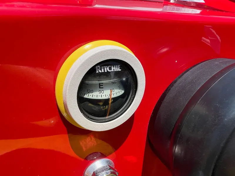 Slide: The Image of Compass on red Kachina Drone 26, 2006 model, with "Ritchie" branding. - 19