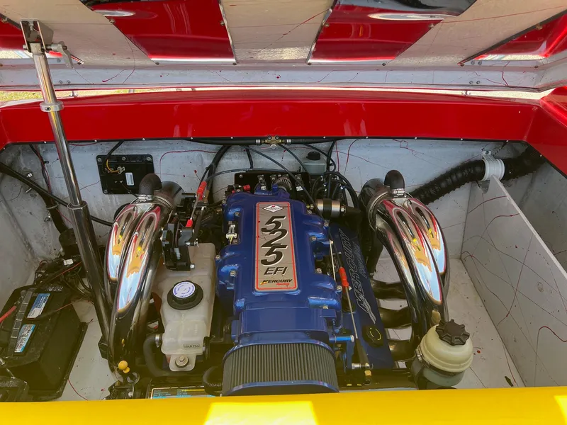 Slide: The Image of Engine compartment of a 2006 Kachina Drone 26 with 525 EFI engine. - 23