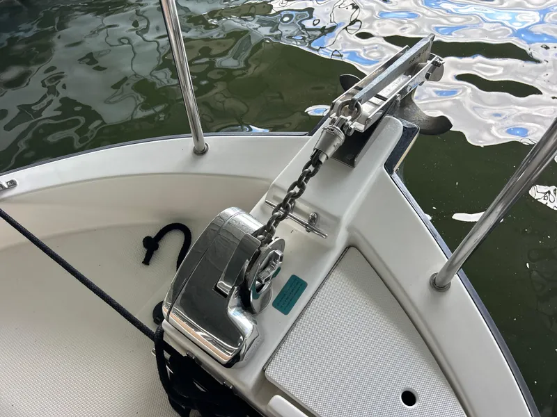 Slide: The Image of Anchor system on 2016 Ranger Tugs R-25SC boat, docked on water. - 12