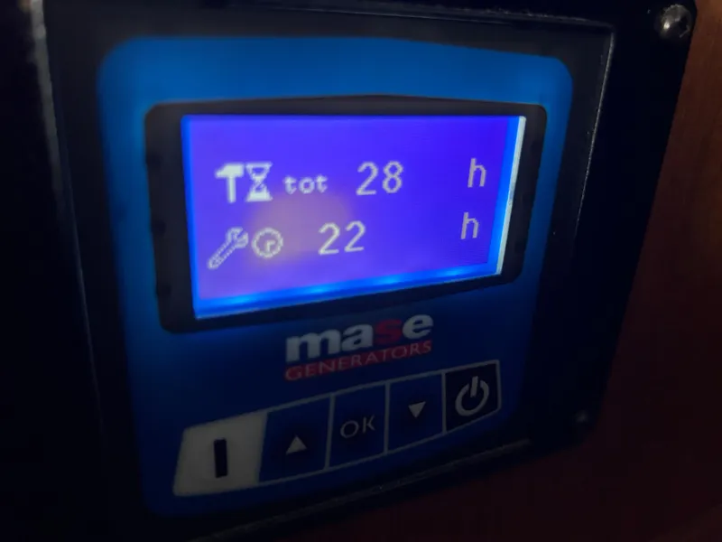 Slide: The Image of Mase generator display showing 28 total hours and 22 maintenance hours on Ranger Tugs R-25SC. - 29