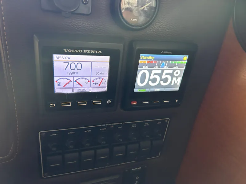 Slide: The Image of Dashboard of 2016 Ranger Tugs R-25SC with Volvo Penta and Garmin displays. - 32