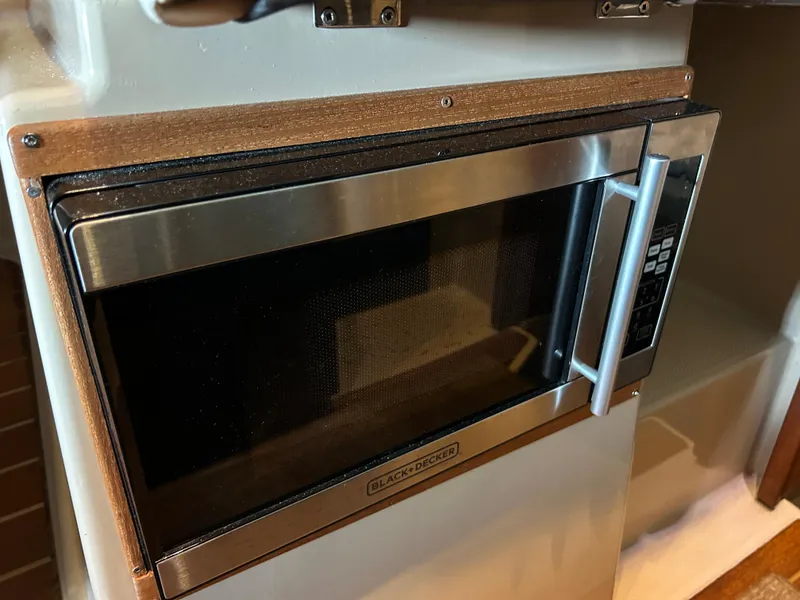 Slide: The Image of Stainless steel microwave in 2016 Ranger Tugs R-25SC boat interior. - 35