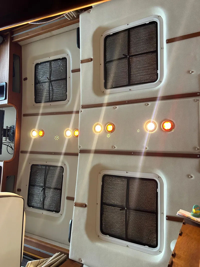 Slide: The Image of Interior view of 2016 Ranger Tugs R-25SC boat with control panel and ventilation. - 40