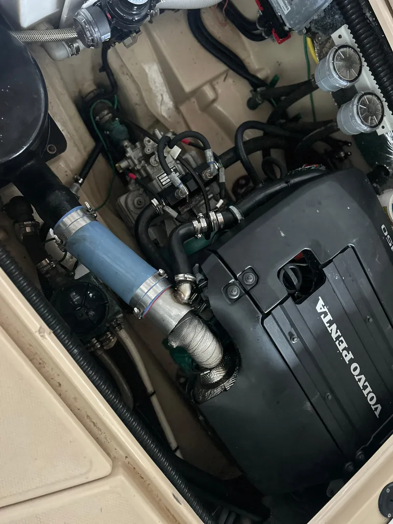 Slide: The Image of Engine compartment of 2016 Ranger Tugs R-25SC with Volvo Penta engine. - 48