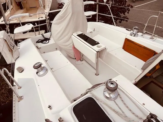 Slide: The Image of 2003 Catalina 36 MkII sailboat cockpit with winches and seating area. - 15