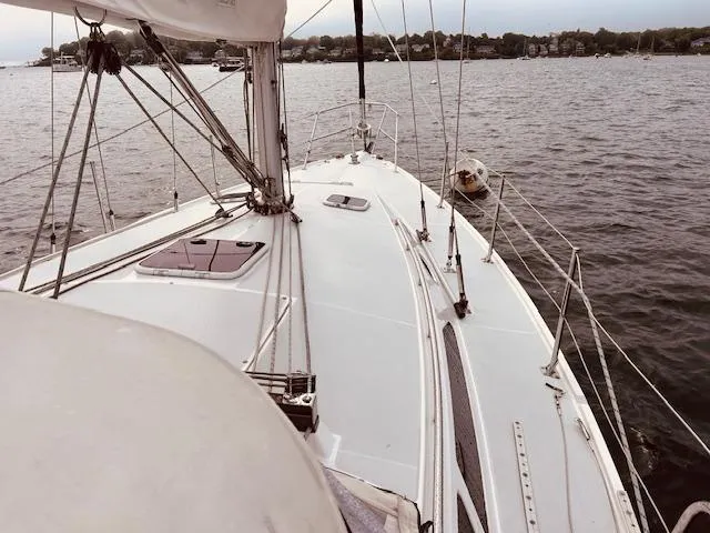 Slide: The Image of Sailing on a 2003 Catalina 36 MkII yacht, calm waters, overcast sky. - 16
