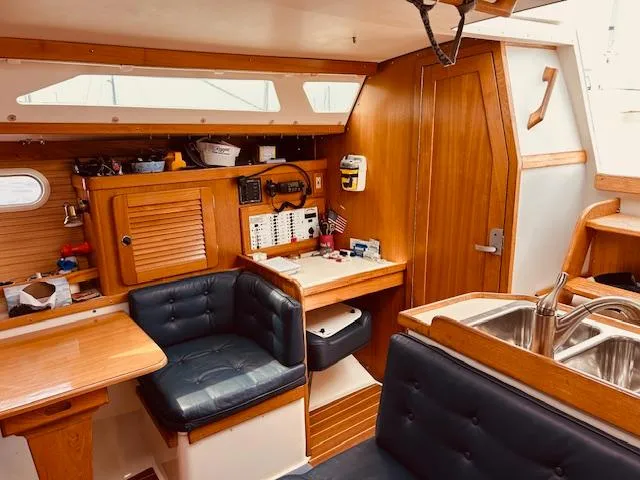 Slide: The Image of Interior of 2003 Catalina 36 MkII sailboat with wood finish and seating area. - 25