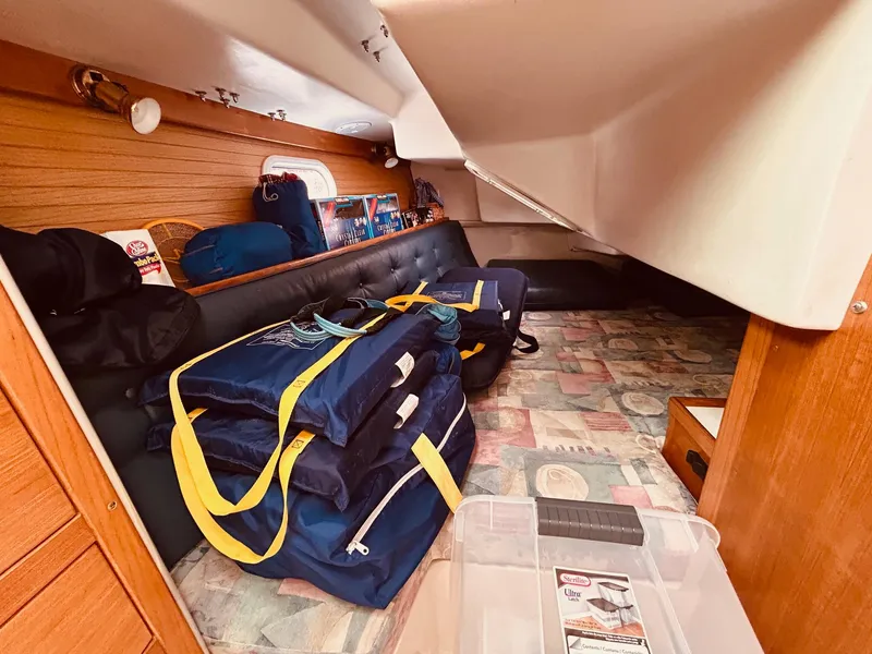 Slide: The Image of Interior cabin of 2003 Catalina 36 MkII sailboat with storage and gear. - 27