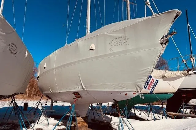 Slide: The Image of 2003 Catalina 36 MkII sailboat on stands, covered for winter storage. - 32